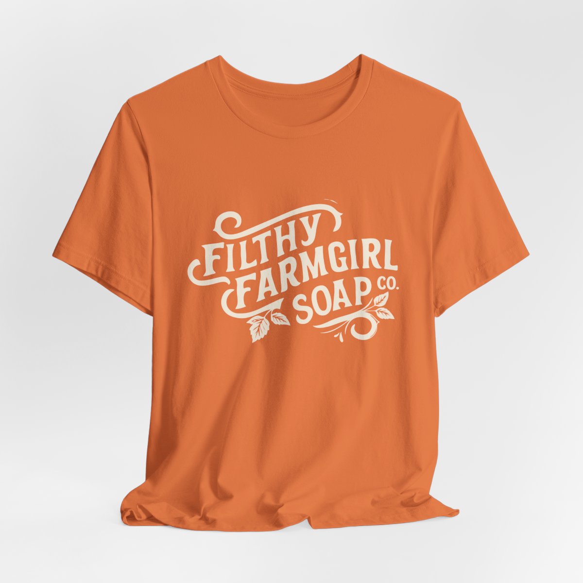 Filthy Farmgirl Soap Co. logo t-shirt in Burnt Orange, unisex 100% cotton BELLA+CANVAS tee